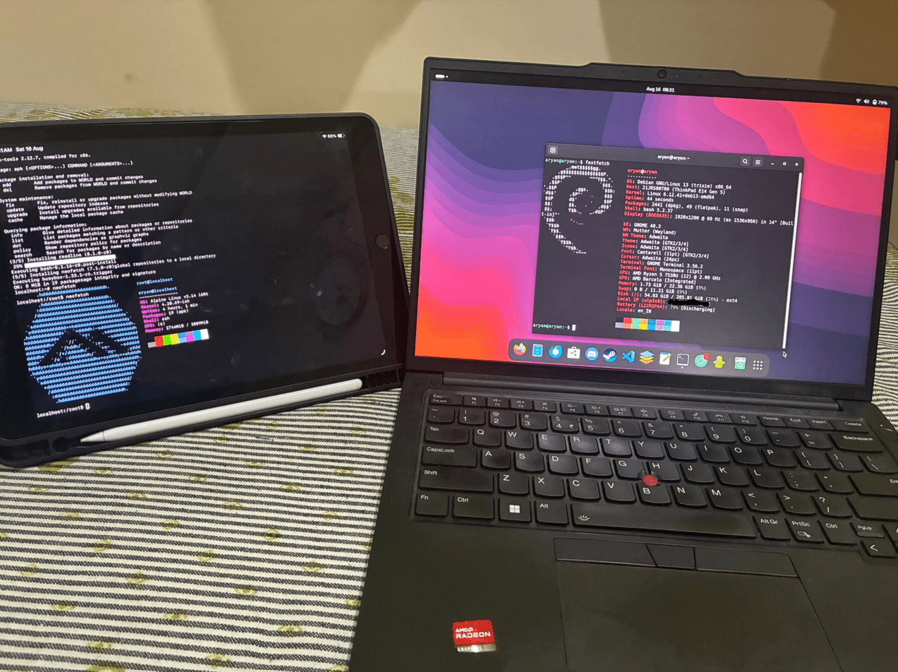 Photo of Alpine Linux on iPad besides a Thinkpad running Debian